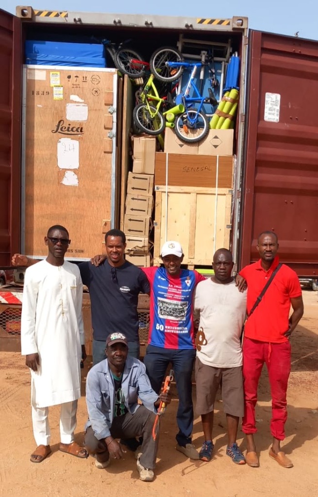 Team at a loaded container
